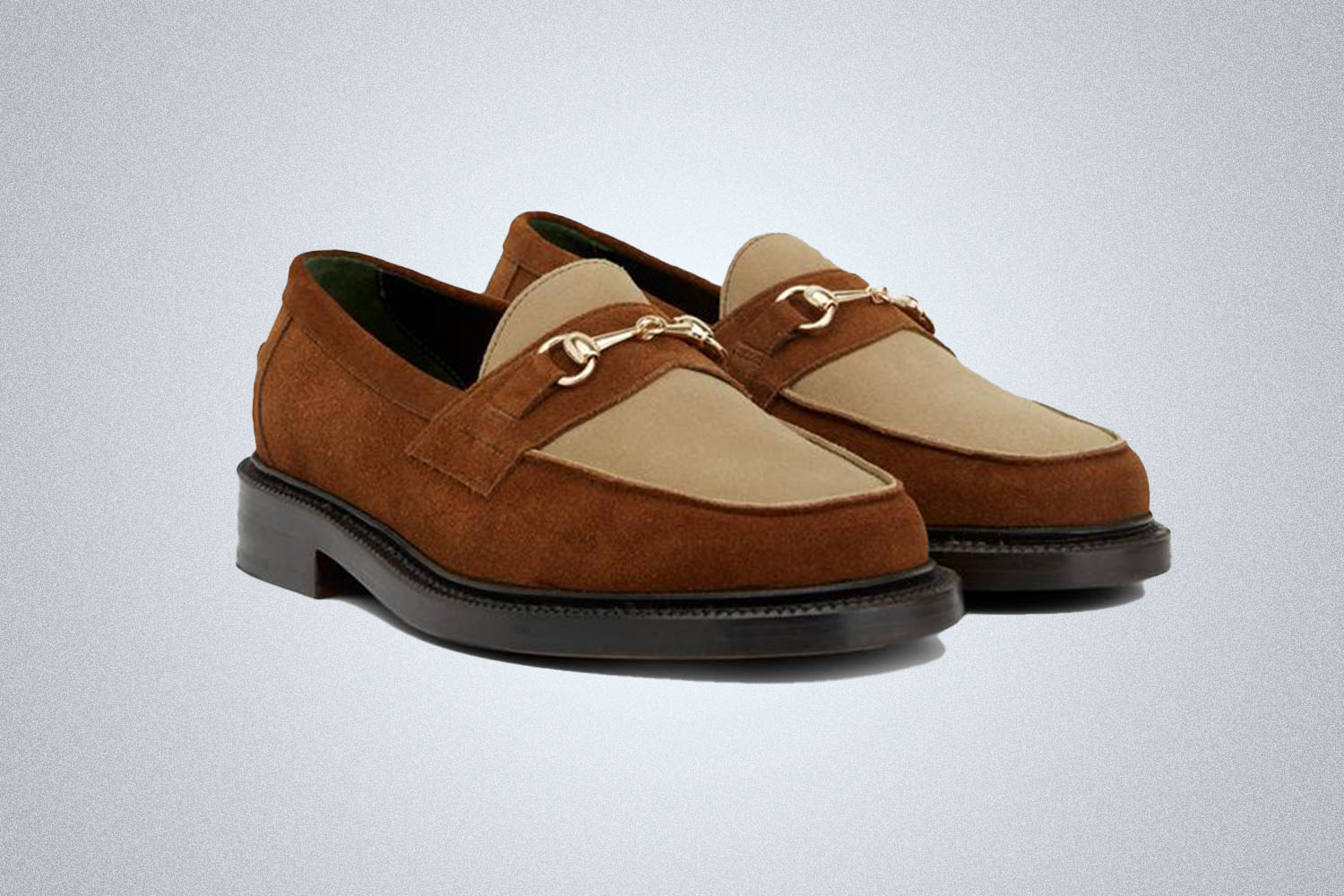 a pair of two-toned brown loafers 