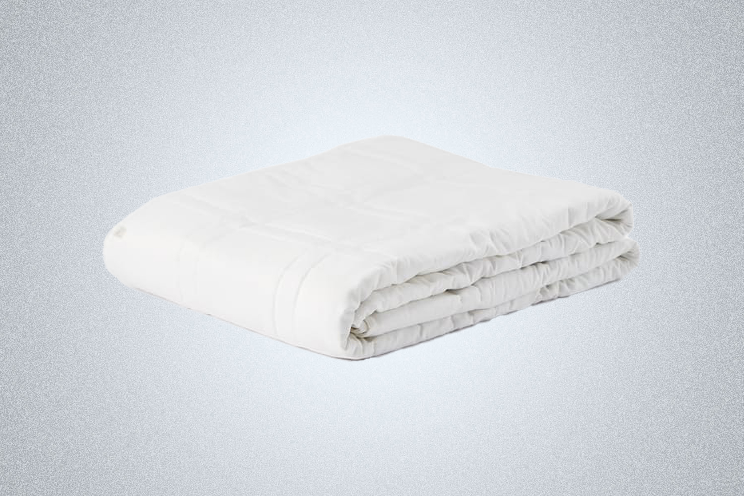 The Baloo Weighted Blanket in white is a weighted sleeping blanket to help you recover from serious workouts with a good night's sleep