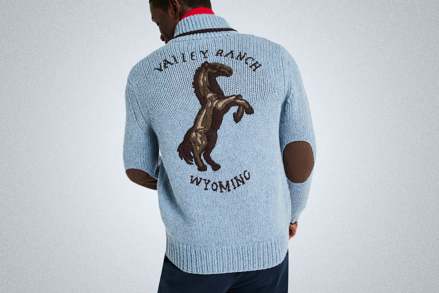 a horse emblazoned sweater 