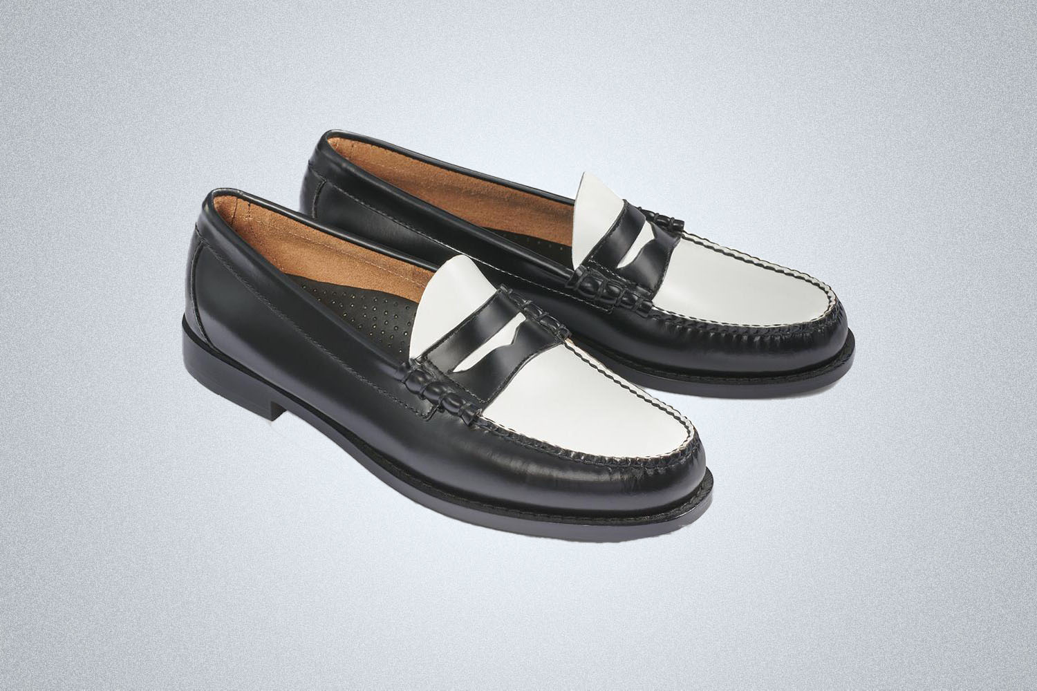 a pair of two toned loafer s
