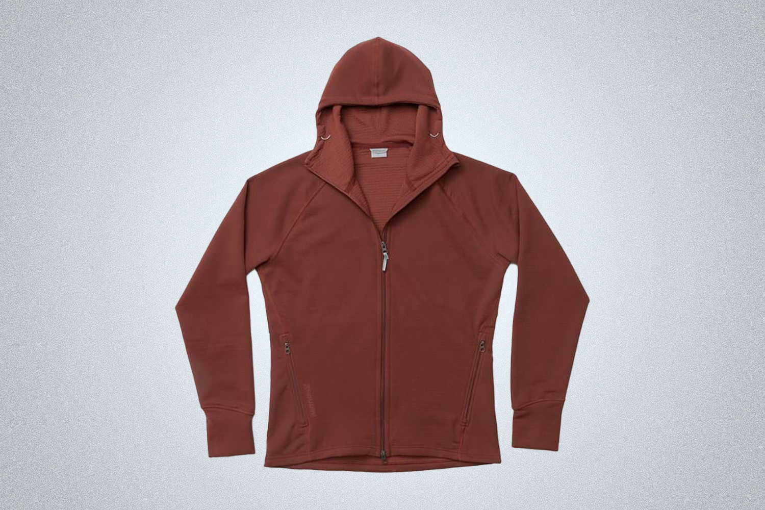 The Houdini Mono Air Houdi in red adds warmth for hiking and camping in the fall