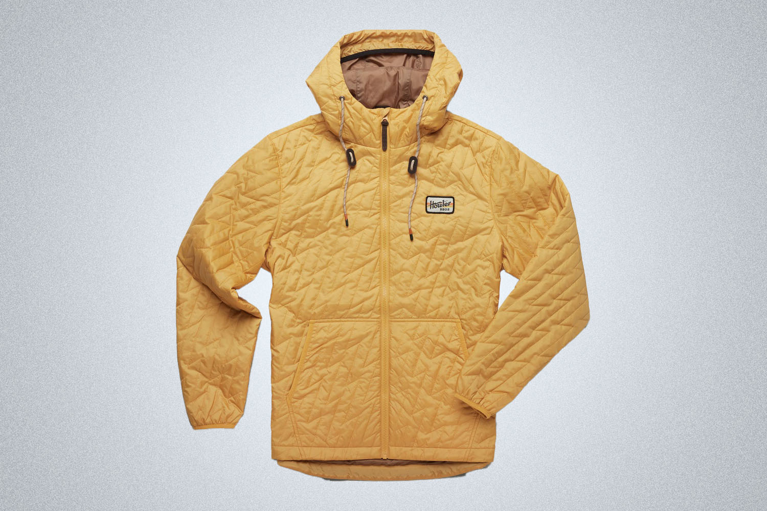 The Howler Bros Voltage Full Zip Jacket in black or yellow is the best jacket for the outdoors when it's cold outside in 2021