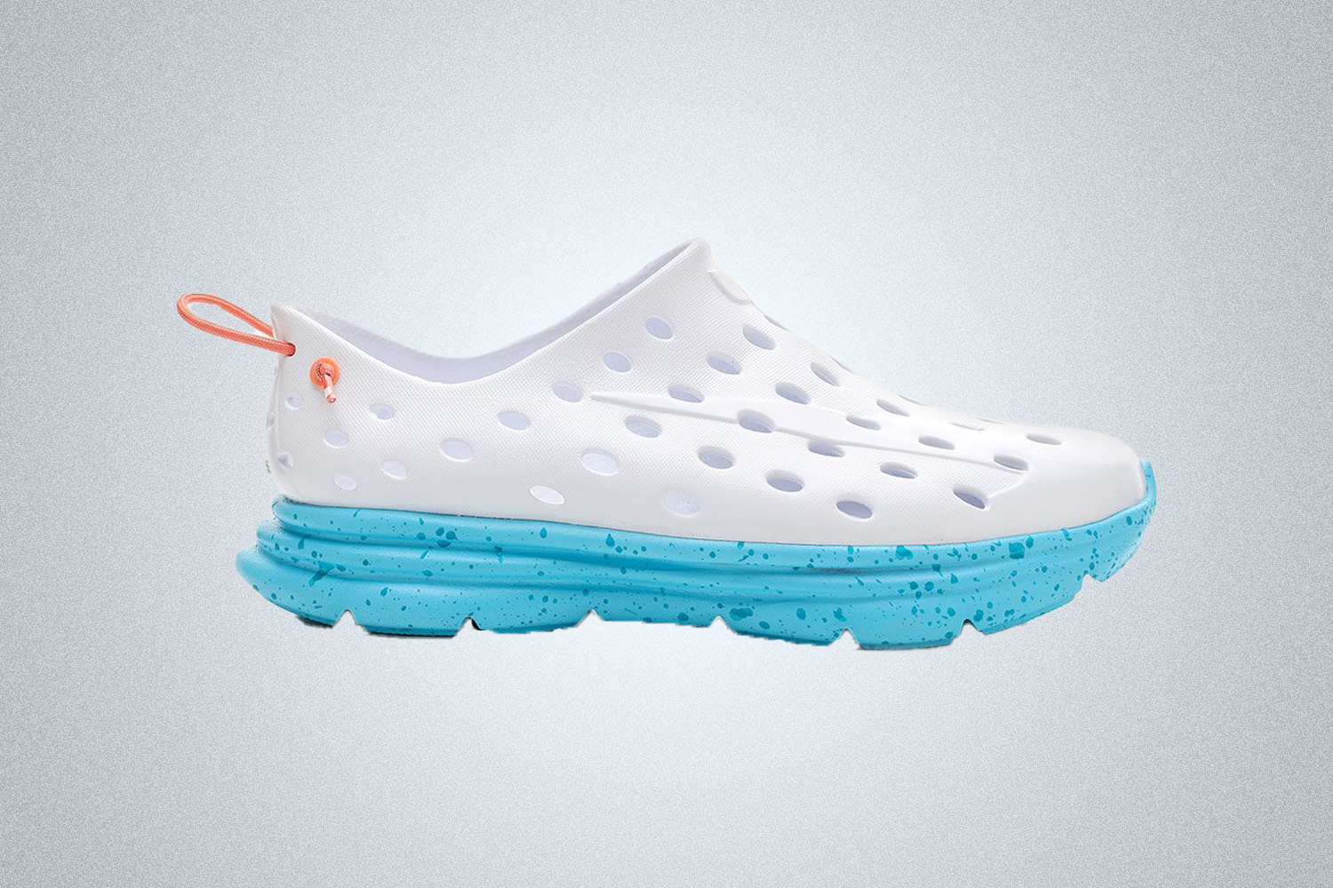 The Kane Revive Recovery Shoe in white and blue is a lightweight recovery shoe to use after working out and running