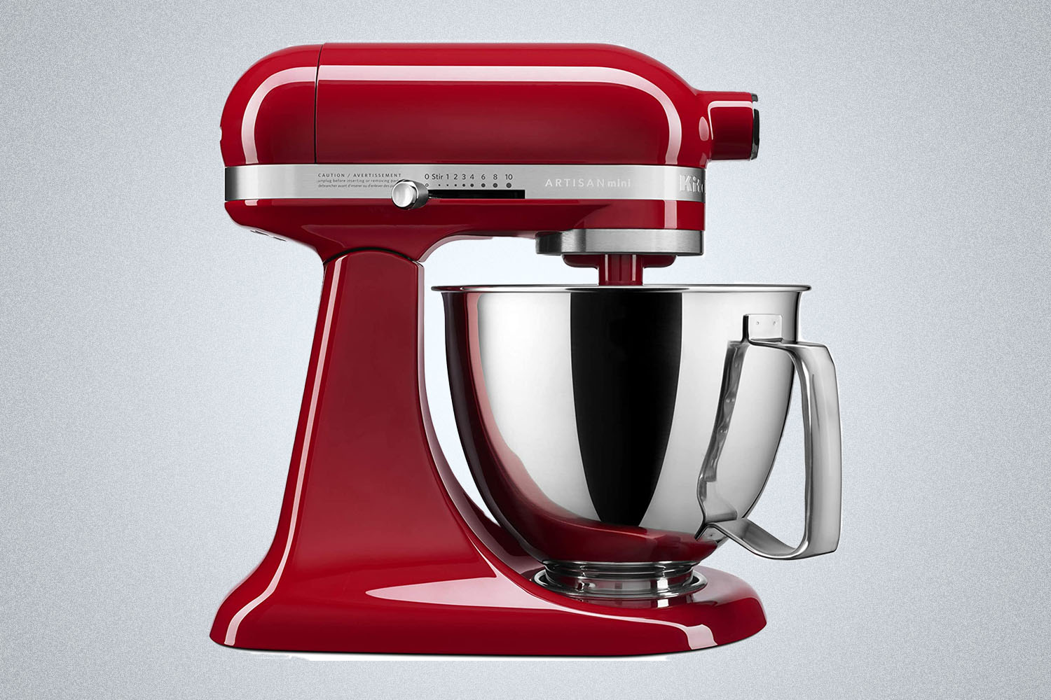 a chrome red stand mixer with bow attachment 