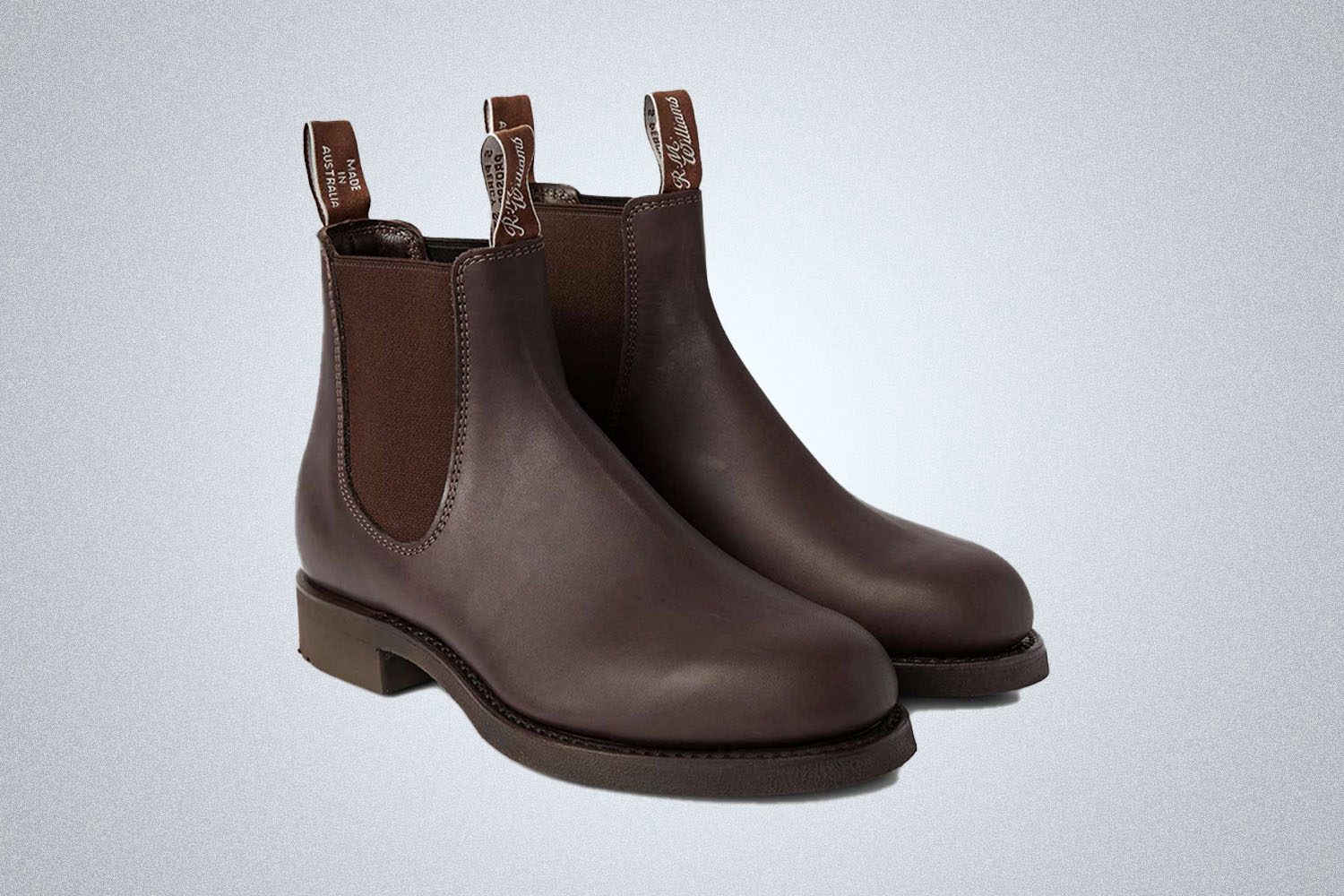 a pair of sleek brown Chelsea boots 