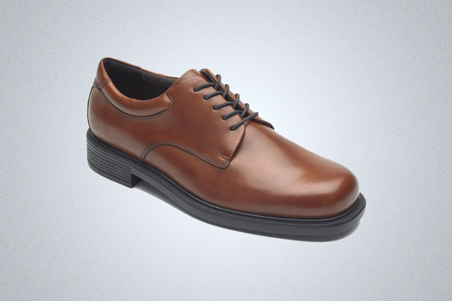 a brown leather shoe
