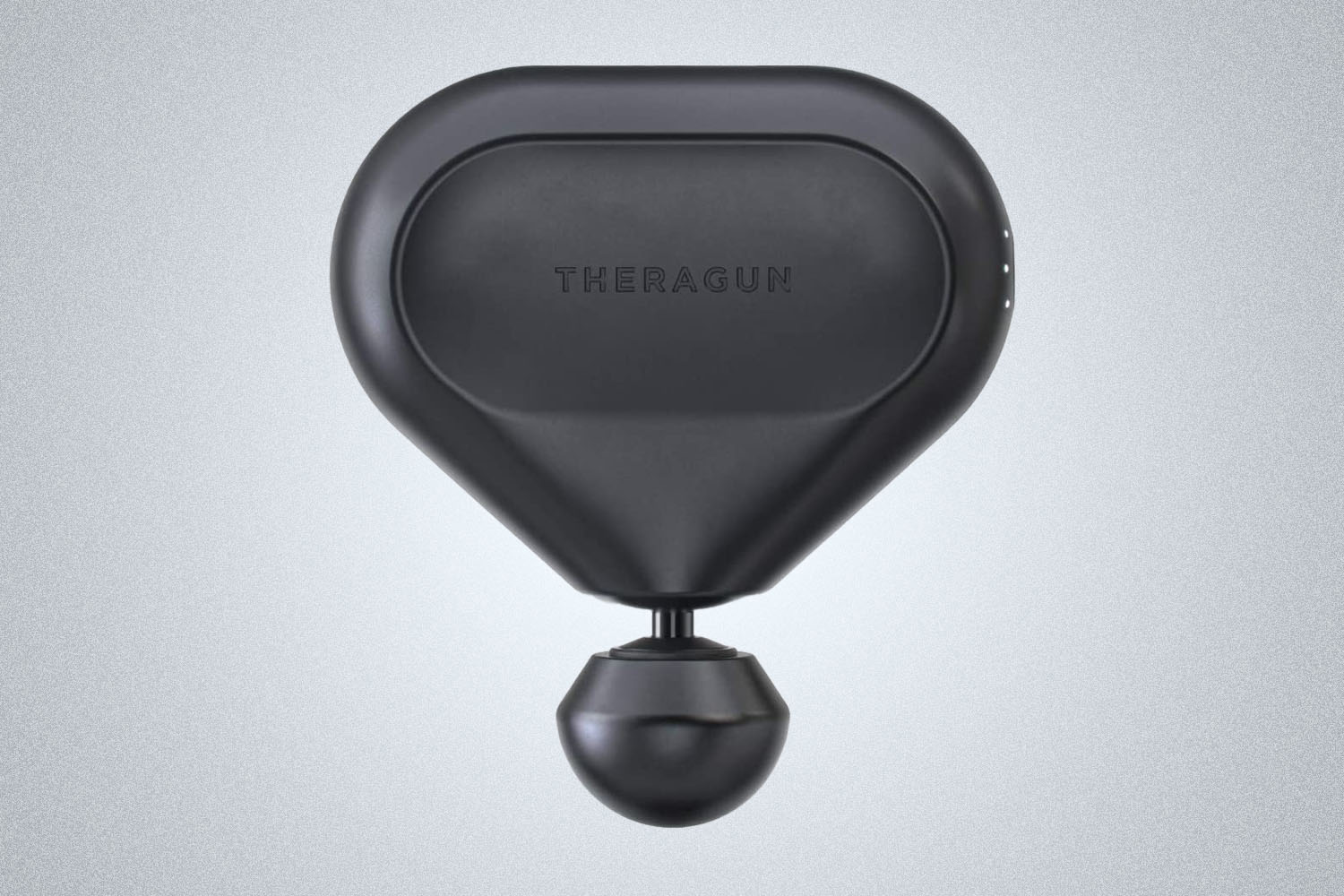 The Theragun Mini in black is a portable percussive massager for muscle relief after fitness workouts that is one of the best percussive massagers in 2021