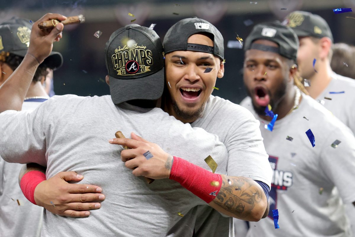Orlando Arcia of the Atlanta Braves celebrates the team's 7-0 victory against the Astros to win the World Series in 2021