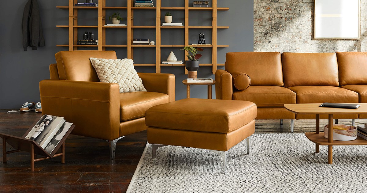 A leather armchair, ottoman and couch from Burrow, all of which are on sale during the furniture brand's early Black Friday sale in November 2021