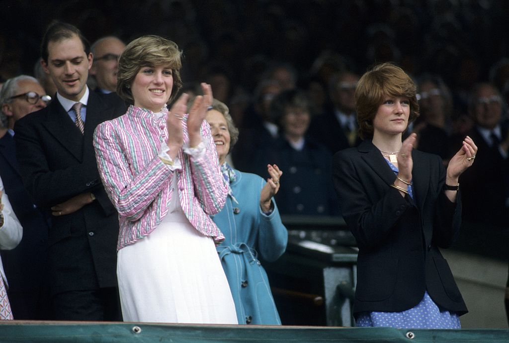 Princess Diana in pink and white at a tennis match in London, England in 1981