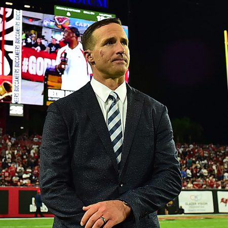 Drew Brees stands on the sideline at Raymond James Stadium in Tampa
