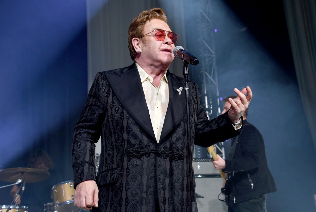 Elton John performs onstage at the 28th Annual Elton John AIDS Foundation Academy Awards