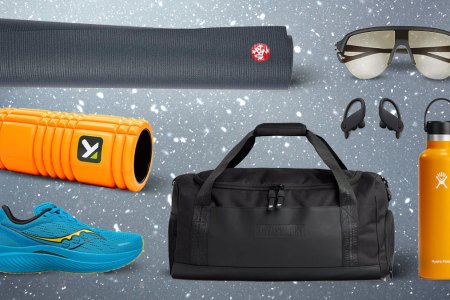 A collage of Fitness gifts on a steely grey flecked background