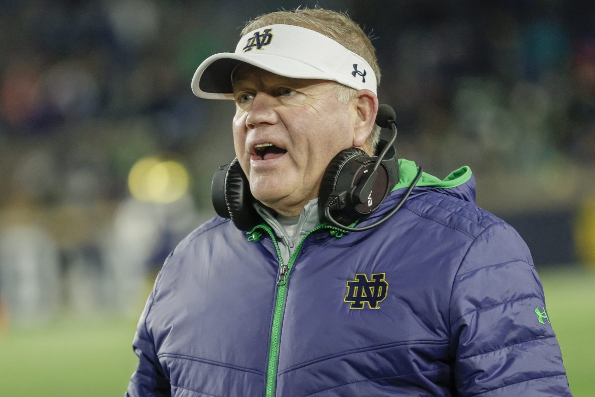 Brian Kelly coaches against the Georgia Tech Yellow Jackets at Notre Dame Stadium
