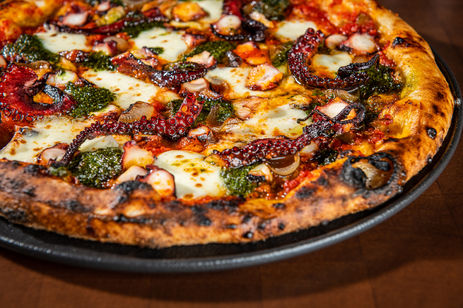 Octaroni pizza with pomodoro, smoked octopus, Caciocavallo cheese and basil pesto from L'Ardente restaurant in Washington, DC