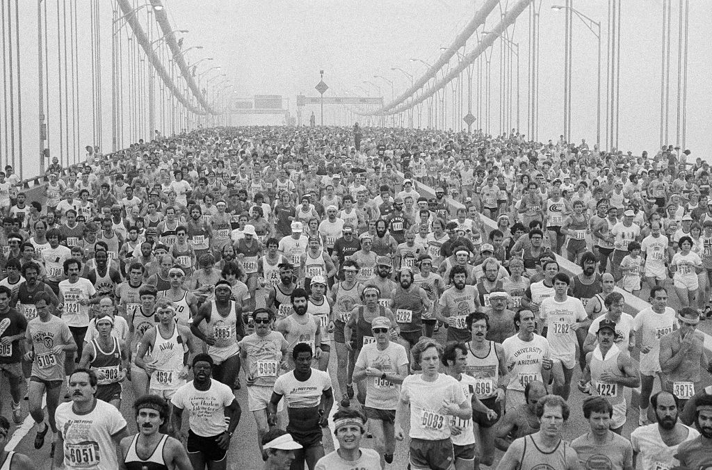 A crowd of runners, more than 14,000, moves across the Verrazano Bridge from Staten Island at the start of the 10th New York City Marathon