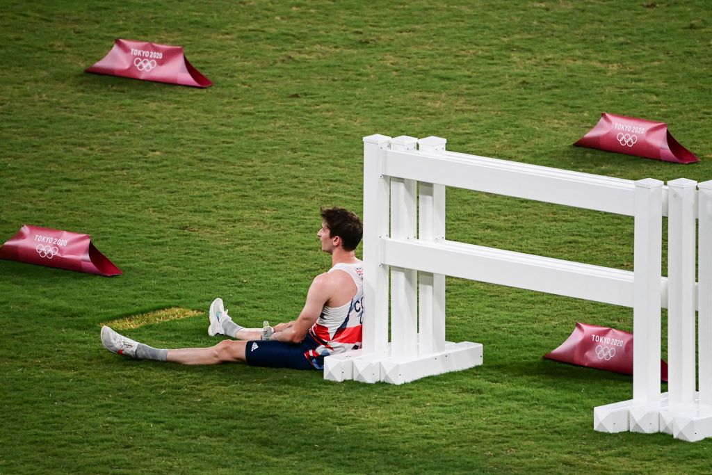 Britain's James Cooke reacts after the men's individual laser run of the modern pentathlon during the Tokyo 2020 Olympic Games at the Tokyo Stadium on August 7, 2021.