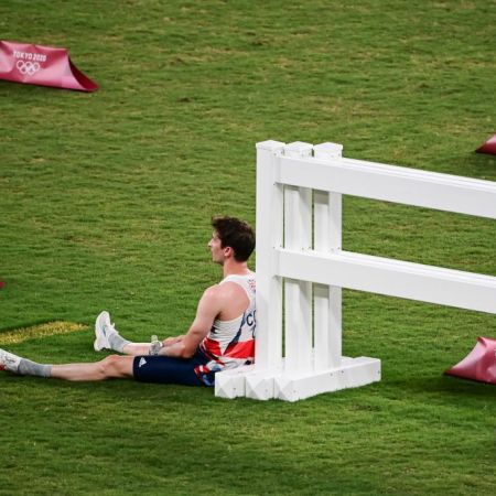 Britain's James Cooke reacts after the men's individual laser run of the modern pentathlon during the Tokyo 2020 Olympic Games at the Tokyo Stadium on August 7, 2021.