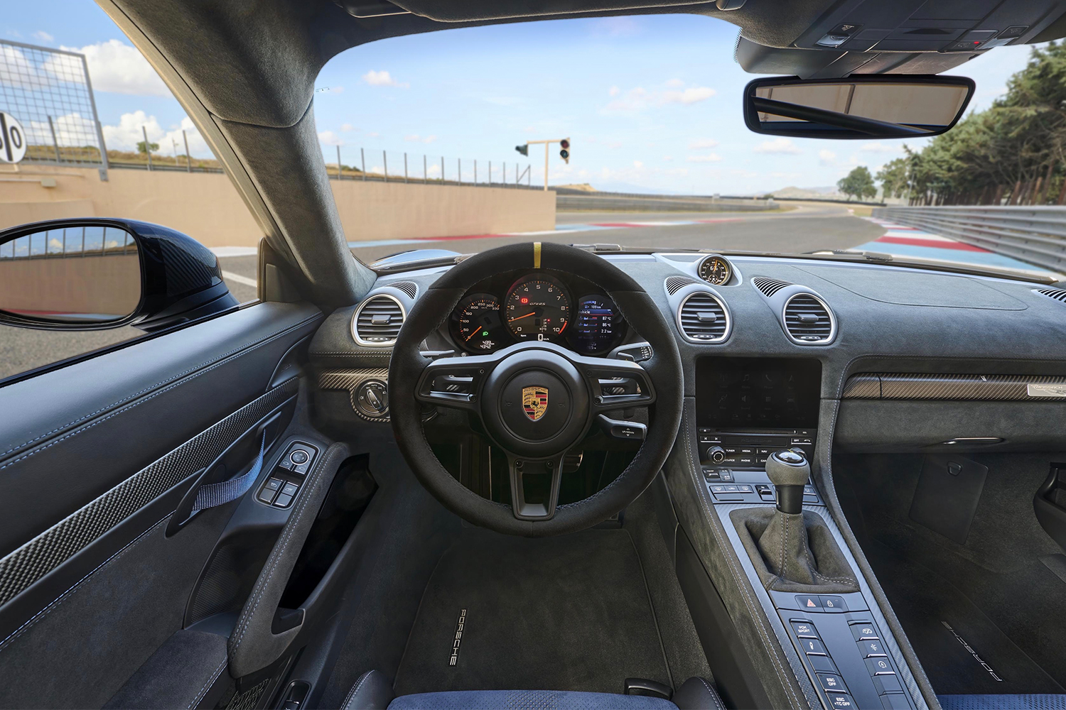 The interior of the Porsche 718 Cayman GT4 RS, a high-end version of the mid-engine sports car coming in 2022