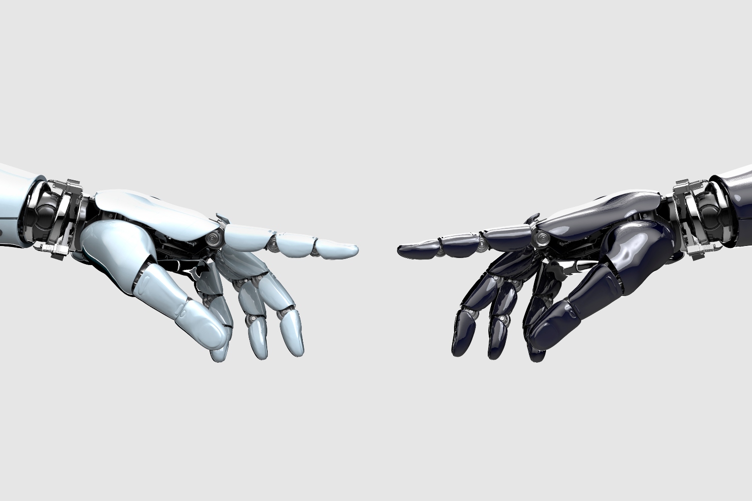Black and white cybernetic robot hands pointing at each other