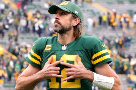 Aaron Rodgers of the Green Bay Packers celebrates after beating Washington