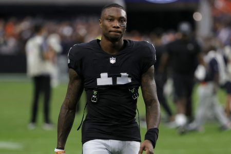 Las Vegas Raiders receiver Henry Ruggs III walks off the field