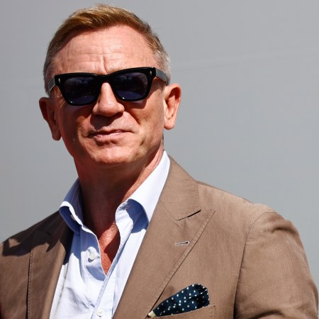 Daniel Craig attends pre-race ceremonies prior to the NASCAR Cup Series Bank of America ROVAL 400 at Charlotte Motor Speedway on October 10, 2021 in Concord, North Carolina. A James Bond producer says the next Bond will be a British man.