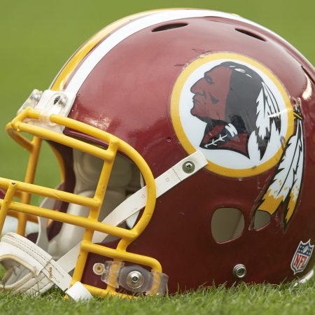 A closeup of Washington's former NFL helmet on the field before a 2014 game