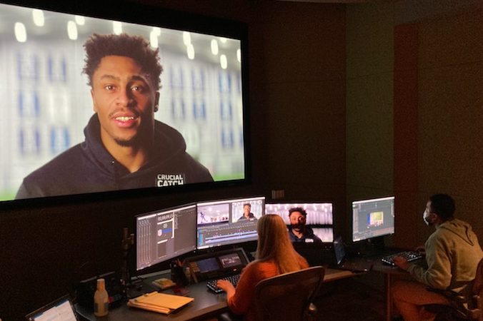 Producers at NFL Films work on an episode of "Hard Knocks" on HBO