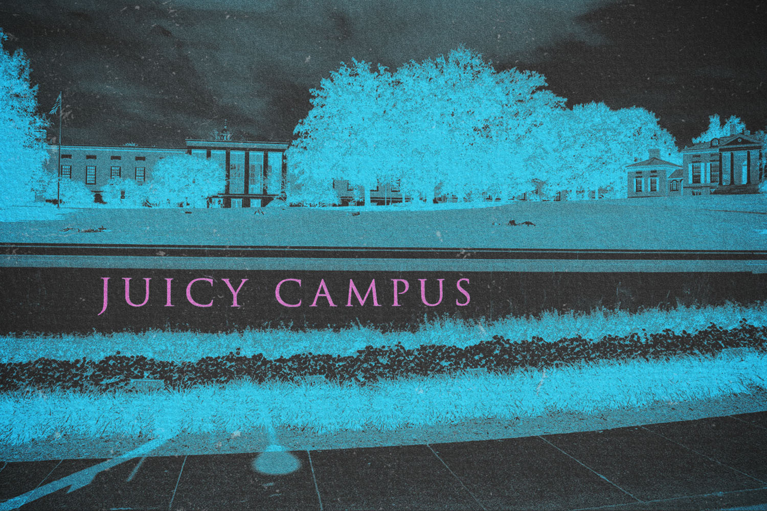 A stone retaining wall in front of a university quad emblazoned with the words "Juicy Campus"