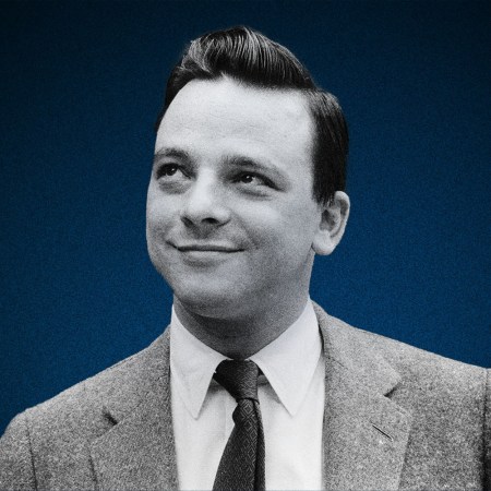 A young Stephen Sondheim in 1962 wearing a suit and tie with his hair slicked. The black and white photo shows him the year he released "A Funny Thing Happened on the Way to the Forum." He died last month in November 2021.