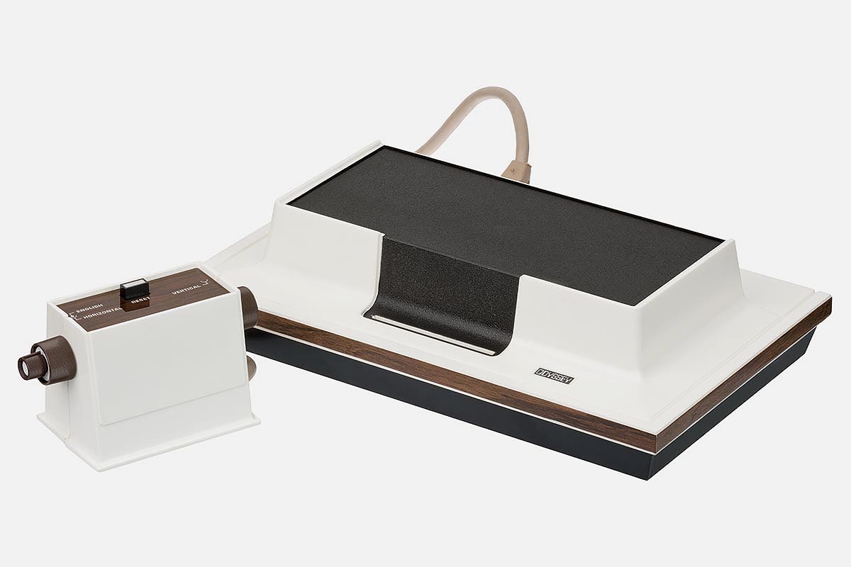 an original Magnavox Odyssey and one of its two accompanyin game controllers