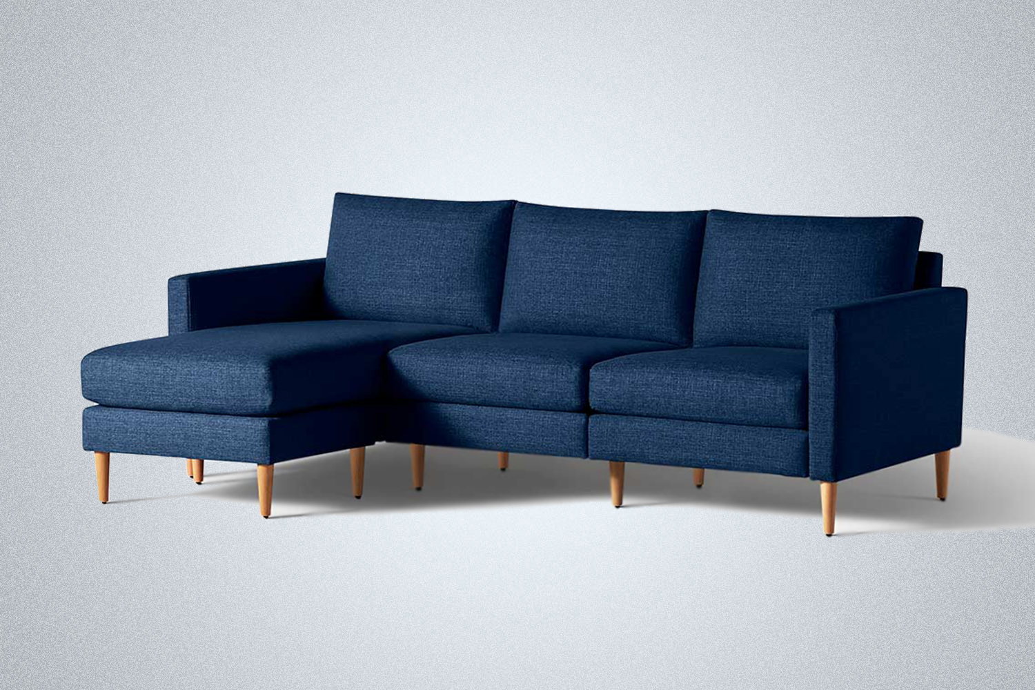 A blue modular sofa from Allform with a chaise on the end