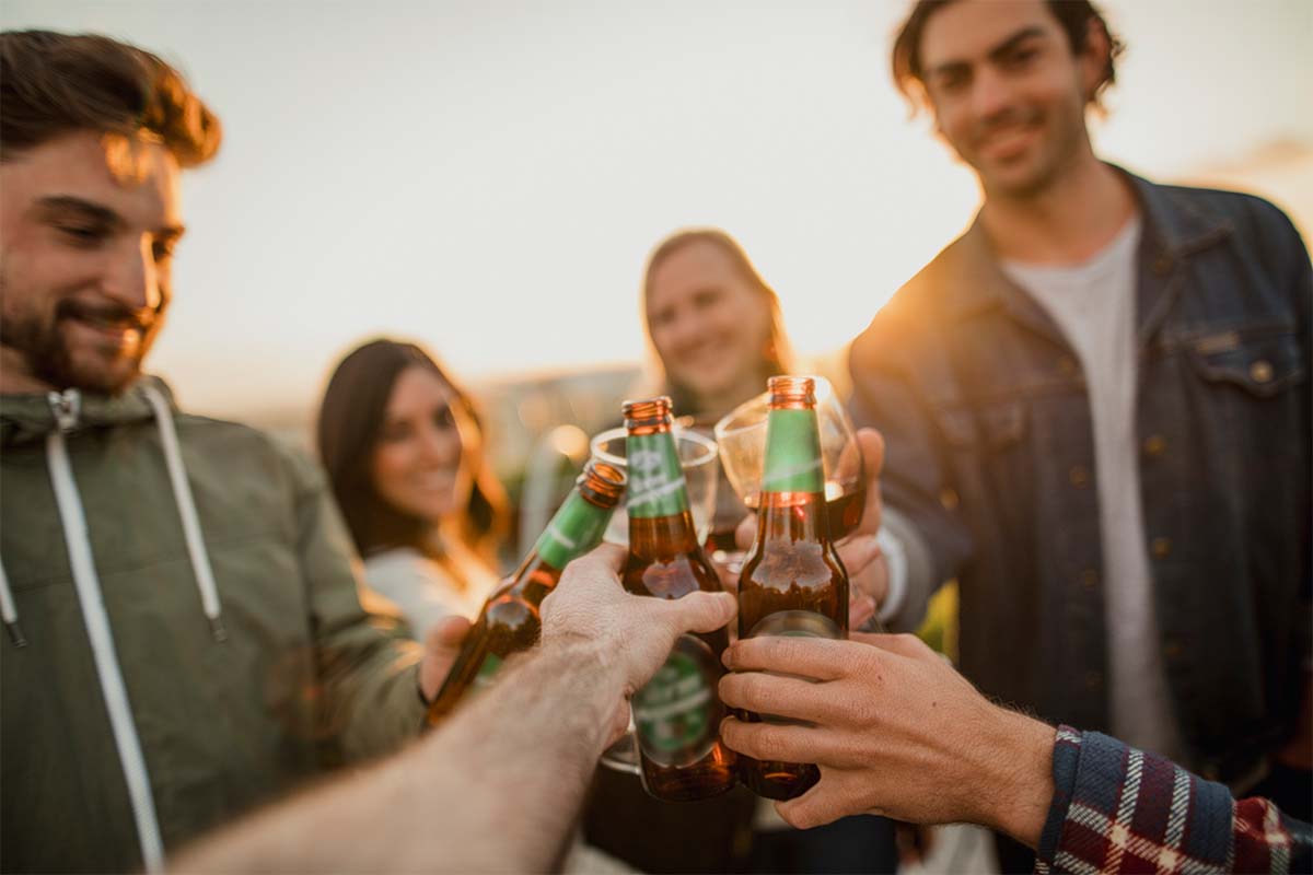 Friends relax and enjoy outdoor drinks together in Australia. People in Australia reported getting "drunk" more often than other country's respondents in a new survey