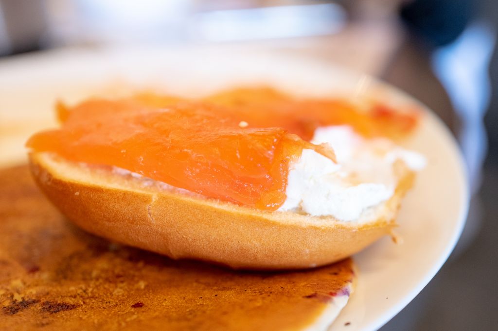 A bagel with lox and cream cheese