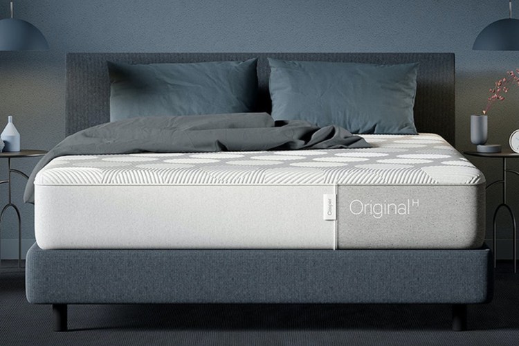 The Casper Original Hybrid Mattress in a blue tone bedroom. The mattress is on sale for Cyber Week 2021.