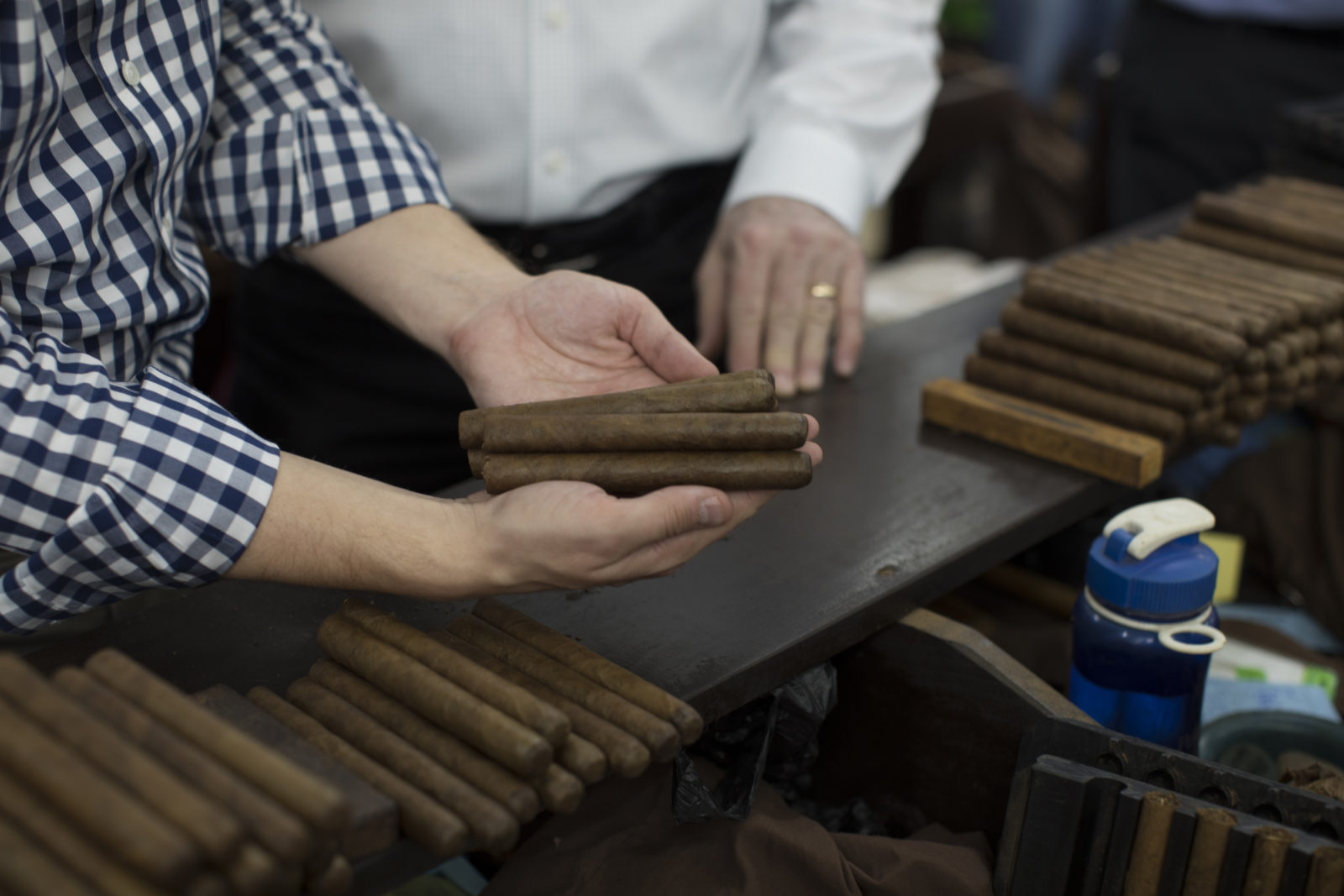 Freshly hand-rolled cigars await their labels at JC Newman