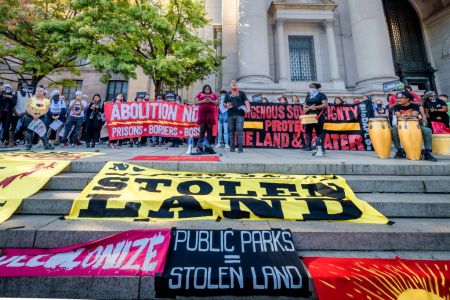 Amin Husain from Decolonize This Place addressing the crowd