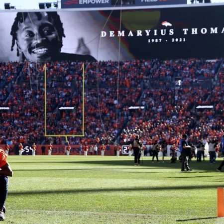 Teddy Bridgewater of the Denver Broncos kneels during the tribute to Demaryius Thomas