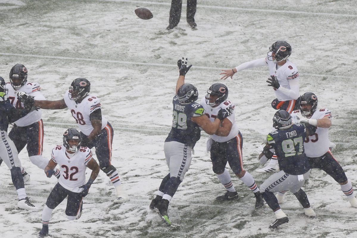 Nick Foles of the Bears throws the ball against the Seattle Seahawks