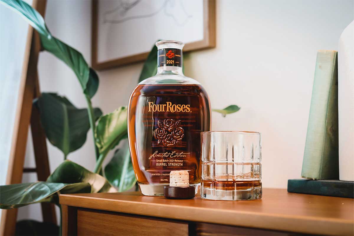 A bottle and a glass of Four Roses Small Batch 2021 Release Barrel Strength