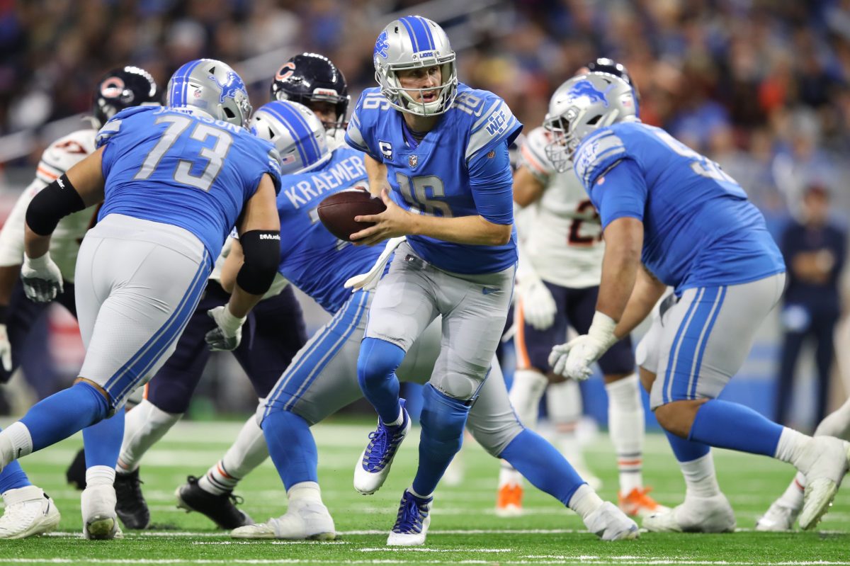 Jared Goff of the Detroit Lions looks to hand off the ball. The Lions, winless, somehow still have a shot of making the playoffs.