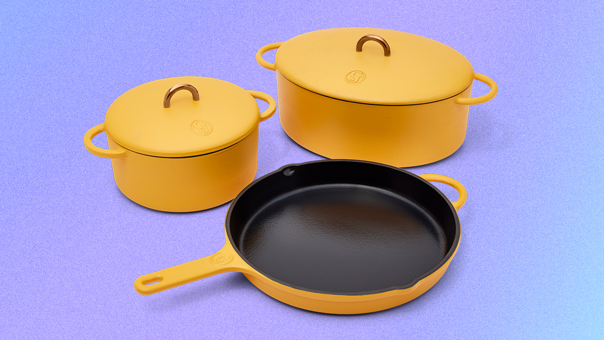 The Dutchess, Dutch Baby and King Sear, three pieces of enameled cast-iron cookware from Great Jones, in the matte yellow color mustard