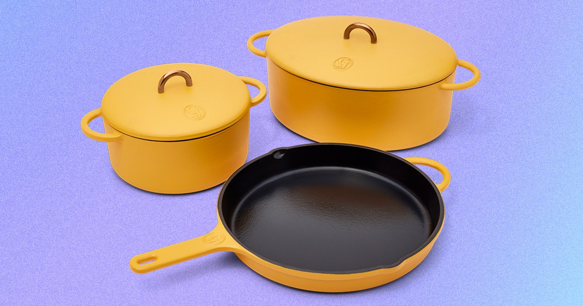 The Dutchess, Dutch Baby and King Sear, three pieces of enameled cast-iron cookware from Great Jones, in the matte yellow color mustard
