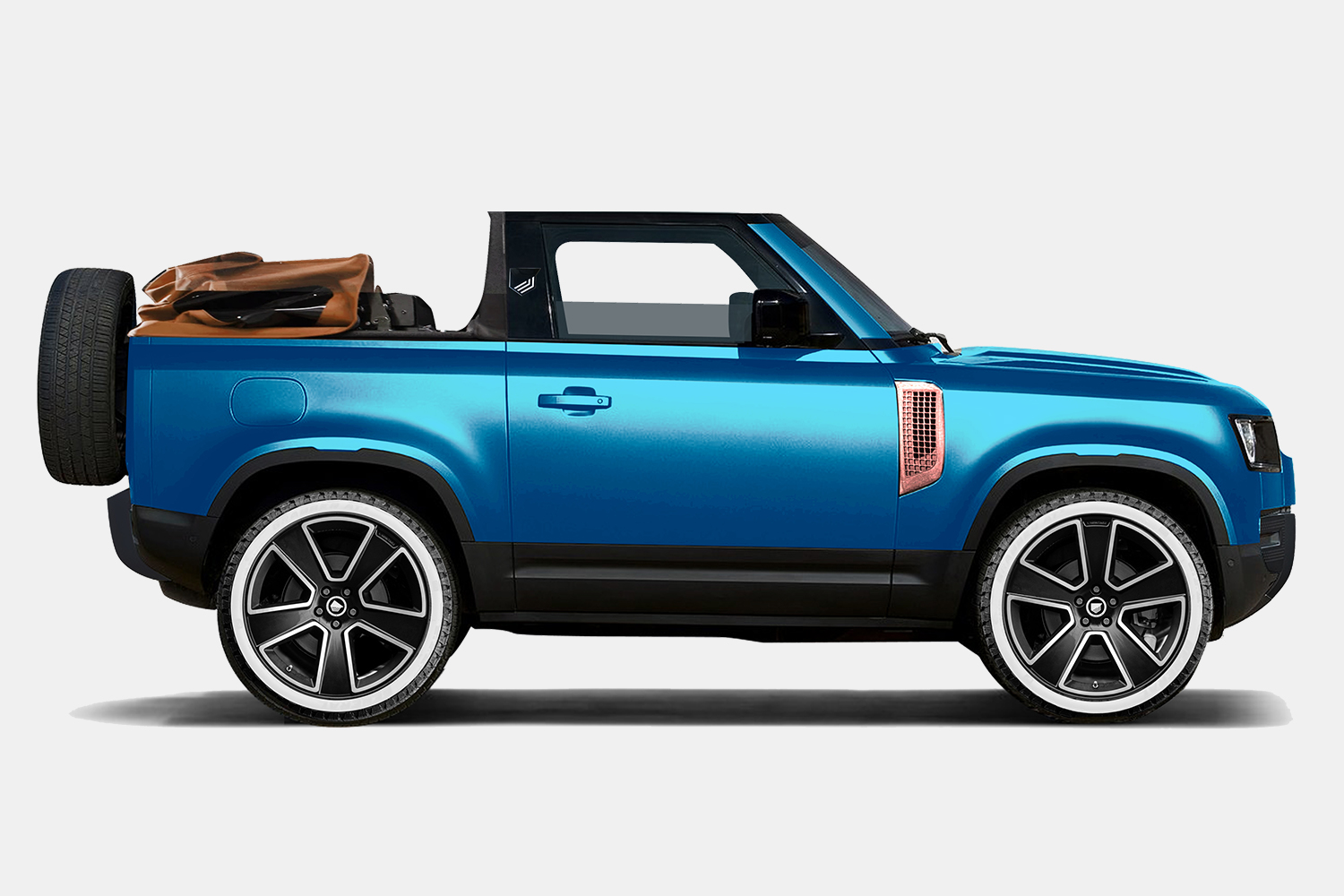 The new Valiance Convertible from Heritage Customs in Côte d’Azur blue. It's a new Land Rover Defender 90 with a soft top that's available in a limited-run in 2022.