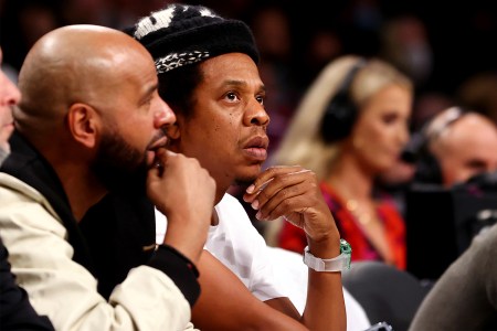 Jay-Z sitting courtside at a Charlotte Hornets and Brooklyn Nets NBA game at Barclays Center wearing a $3 million Richard Mille watch
