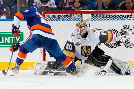 Vegas Golden Knights Robin Lehner goalie protects the net against the New York Islanders. The NHL recently announced a small pause in its season.