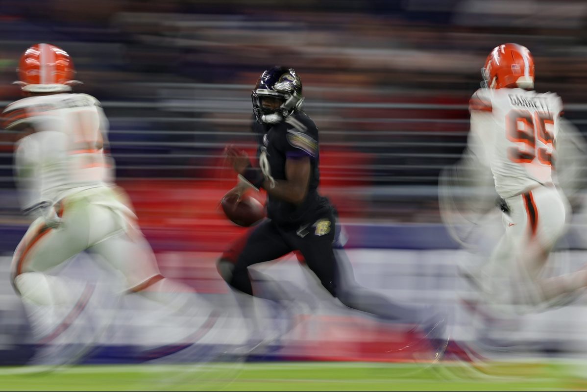 Lamar Jackson of the Baltimore Ravens runs with the ball against the Cleveland Browns