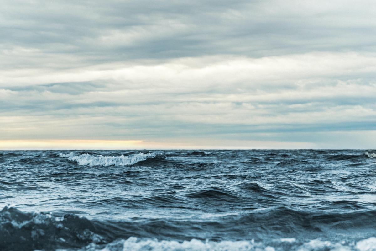 Whitecaps on the ocean under a cloudy sky. The National Academy of Sciences is studying ways of geoengineering the oceans to thwart climate change.