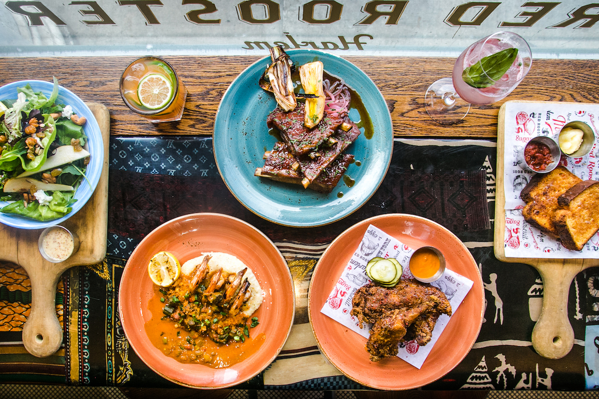 A number of iconic red rooster dishes from Marcus Samuelsson